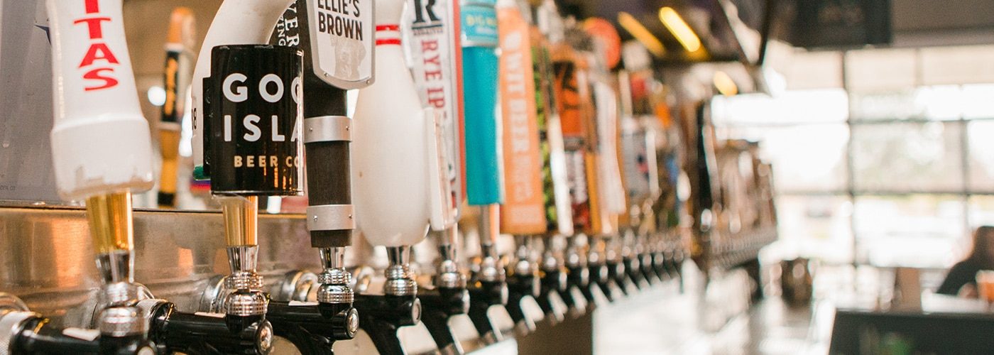 The tap wall at Parry's — 100 draft beers
